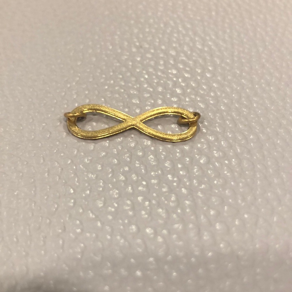 Gold infinity charm